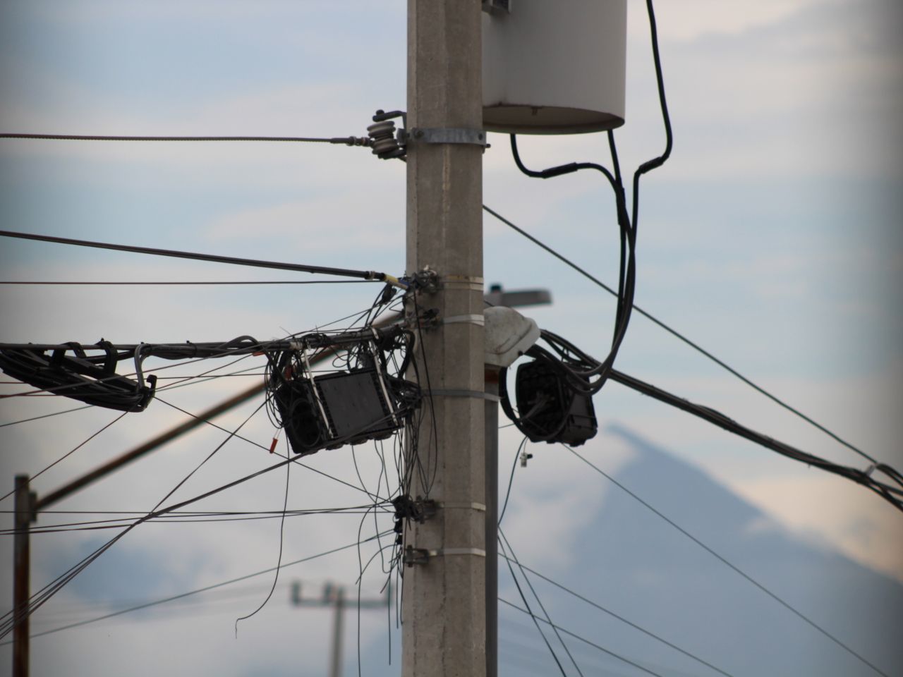 light or electrical pole with a fiber optic communications box